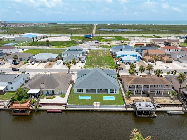 15501 Cruiser St Unit A, Corpus Christi, TX 78418 - aerial view of residential area with a large body of water