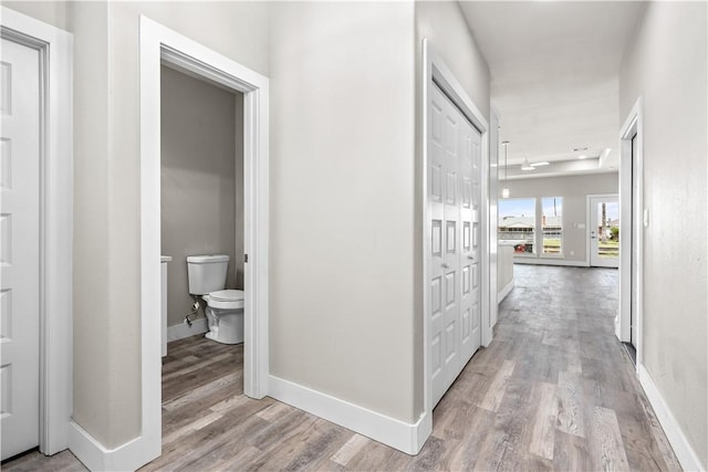 15501 Cruiser St Unit A, Corpus Christi, TX 78418 - corridor with light wood-style flooring and baseboards