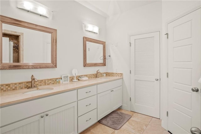 bathroom with vanity and tile patterned floors