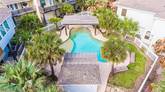 view of swimming pool featuring a pergola