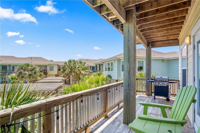 balcony featuring area for grilling