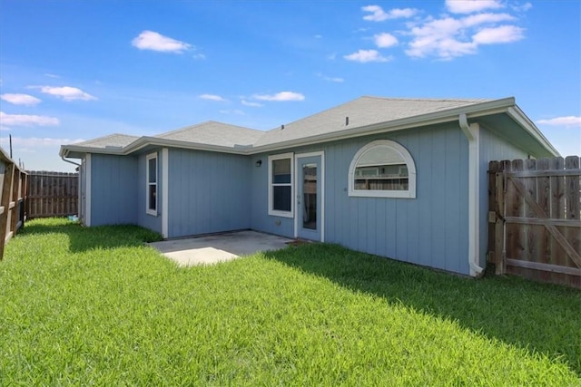 6753 Mikayla St, Corpus Christi, TX 78413 - rear view of house with a fenced backyard and a patio area