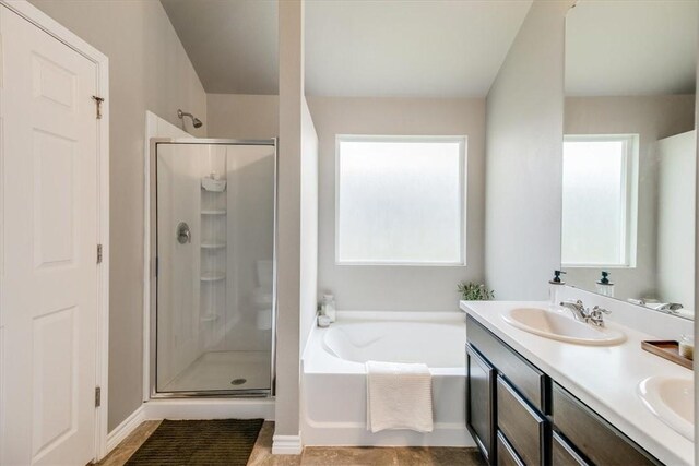 6753 Mikayla St, Corpus Christi, TX 78413 - full bathroom with a stall shower, a garden tub, and double vanity