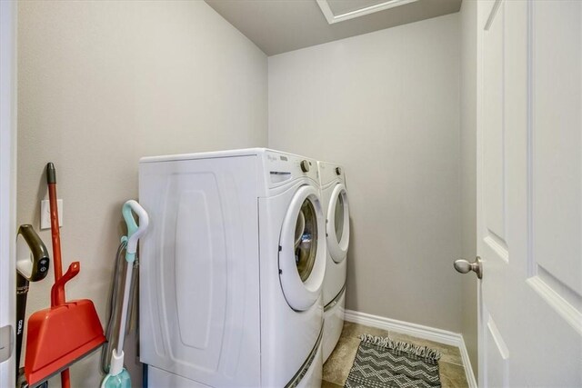 6753 Mikayla St, Corpus Christi, TX 78413 - laundry area with washer and dryer and tile patterned flooring