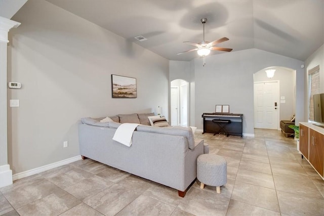 6753 Mikayla St, Corpus Christi, TX 78413 - living room with arched walkways, ceiling fan, vaulted ceiling, and light tile patterned floors