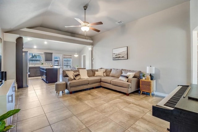 6753 Mikayla St, Corpus Christi, TX 78413 - living room featuring vaulted ceiling, a ceiling fan, and light tile patterned floors
