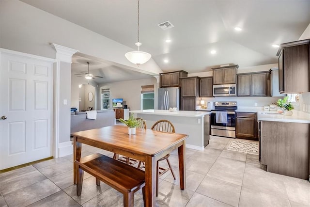 6753 Mikayla St, Corpus Christi, TX 78413 - dining room featuring lofted ceiling, ceiling fan, and light tile patterned flooring