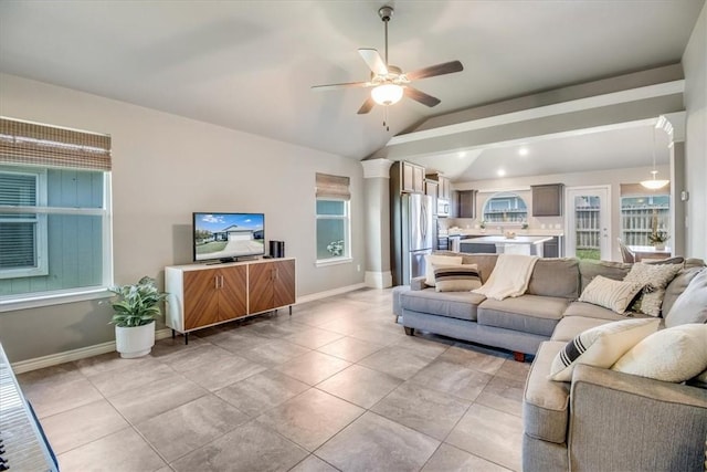 6753 Mikayla St, Corpus Christi, TX 78413 - living area featuring lofted ceiling, ceiling fan, and light tile patterned floors