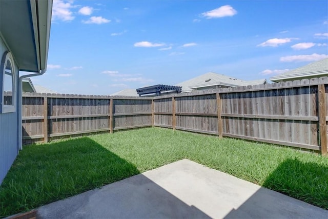 6753 Mikayla St, Corpus Christi, TX 78413 - fenced backyard with a patio