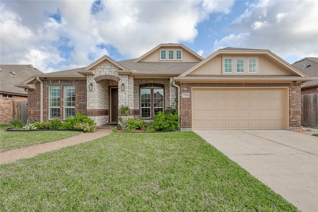 view of front facade featuring a front lawn and a garage