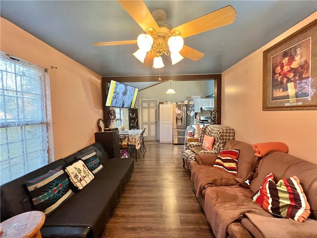 living room featuring dark hardwood / wood-style floors and ceiling fan