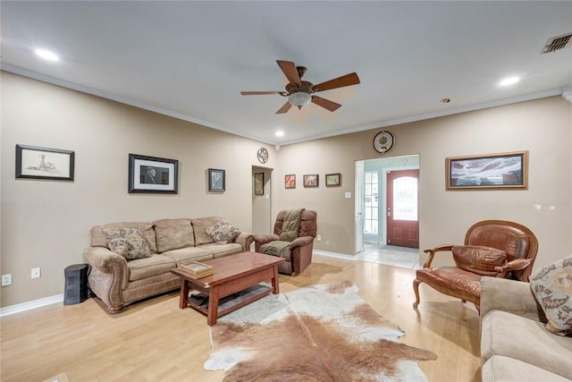 7313 Prairie Dr, Corpus Christi, TX 78413 - living area featuring a ceiling fan, light wood finished floors, ornamental molding, and recessed lighting