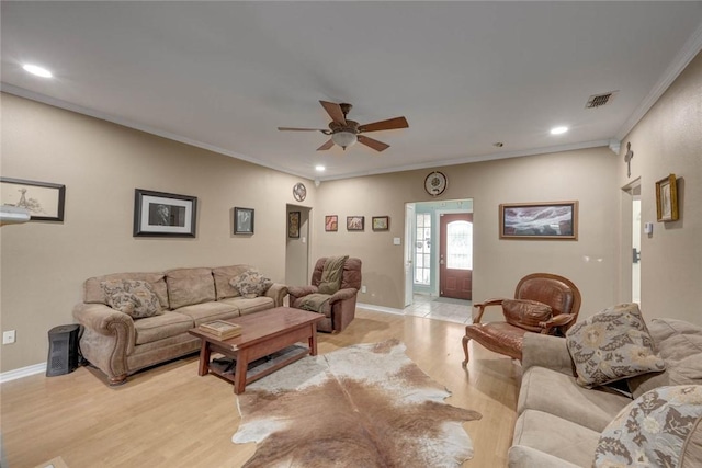 7313 Prairie Dr, Corpus Christi, TX 78413 - living area with ceiling fan, light wood finished floors, recessed lighting, and ornamental molding