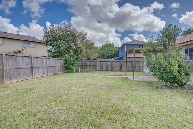 7313 Prairie Dr, Corpus Christi, TX 78413 - fenced backyard with a patio area