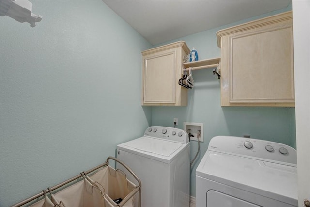 7313 Prairie Dr, Corpus Christi, TX 78413 - washroom with washer and clothes dryer and cabinet space