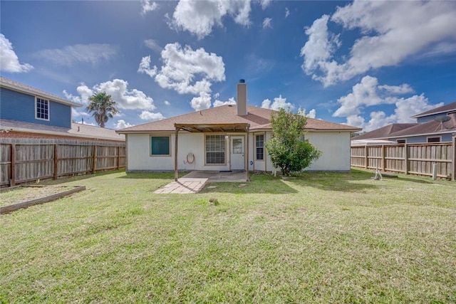 7313 Prairie Dr, Corpus Christi, TX 78413 - rear view of house with a patio area, a fenced backyard, and a chimney
