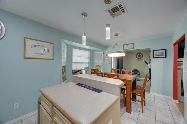 7313 Prairie Dr, Corpus Christi, TX 78413 - dining room featuring light tile patterned floors and baseboards