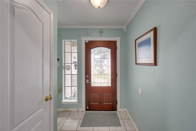7313 Prairie Dr, Corpus Christi, TX 78413 - entryway featuring light tile patterned floors and crown molding