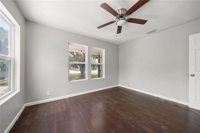 3740 Brooks Dr, Corpus Christi, TX 78408 - empty room featuring plenty of natural light, wood finished floors, and ceiling fan