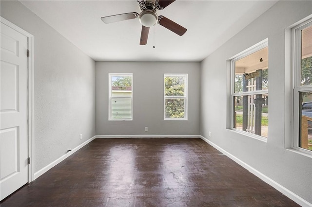 3740 Brooks Dr, Corpus Christi, TX 78408 - unfurnished room featuring plenty of natural light, wood finished floors, and ceiling fan