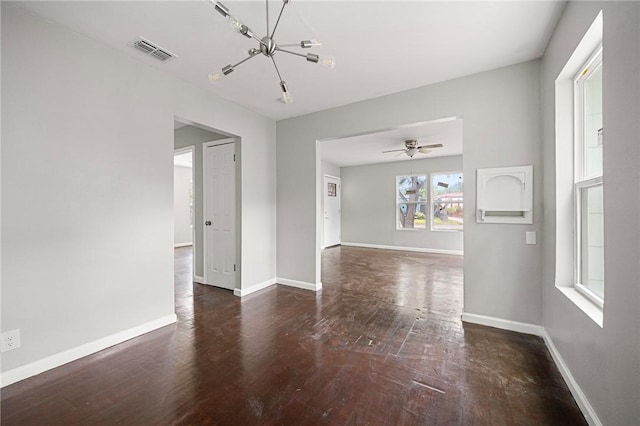 3740 Brooks Dr, Corpus Christi, TX 78408 - spare room with a chandelier and wood finished floors