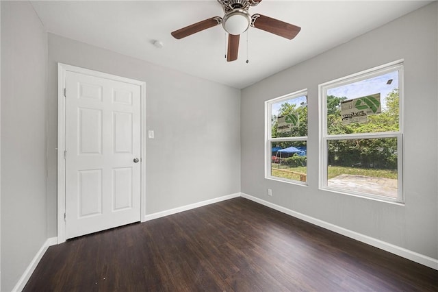3740 Brooks Dr, Corpus Christi, TX 78408 - spare room featuring dark wood-style floors, ceiling fan, and a smoke detector