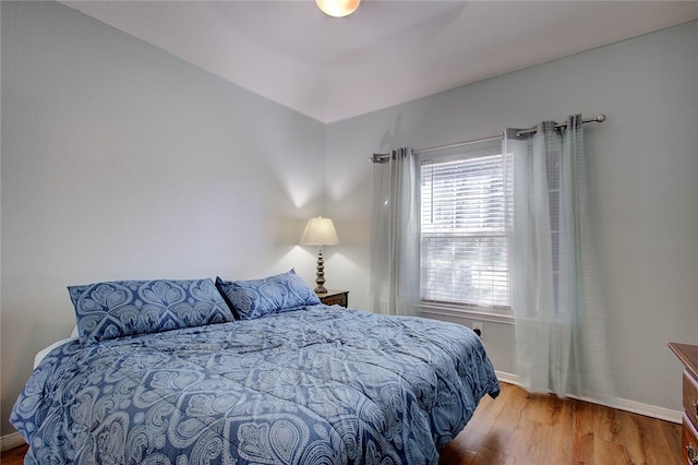 bedroom featuring hardwood / wood-style floors