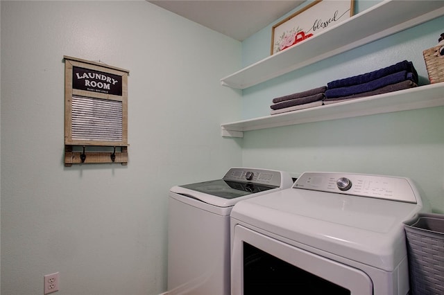 laundry room featuring separate washer and dryer