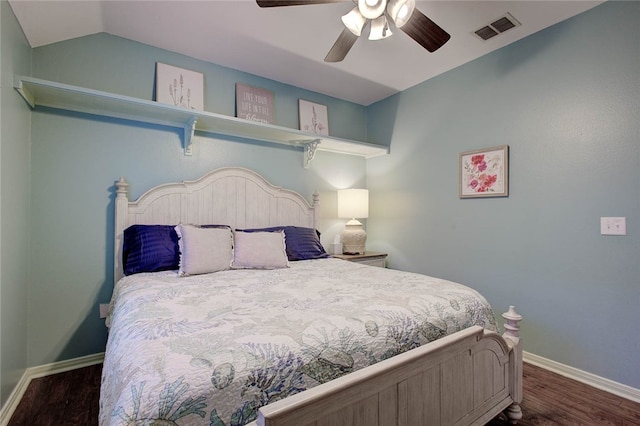 bedroom featuring lofted ceiling, ceiling fan, and dark hardwood / wood-style floors