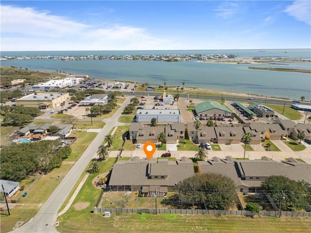 bird's eye view featuring a residential view and a water view