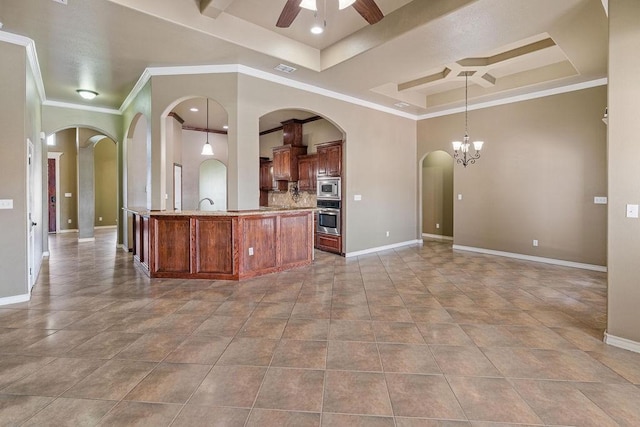 6901 Ridgeline Ct, Corpus Christi, TX 78413 - kitchen featuring stainless steel appliances, baseboards, ceiling fan, arched walkways, and coffered ceiling