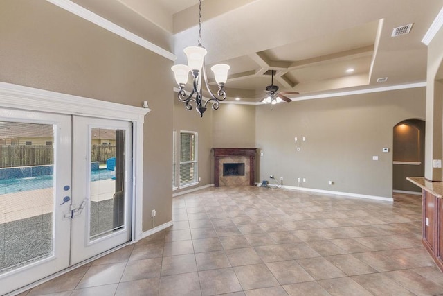 6901 Ridgeline Ct, Corpus Christi, TX 78413 - unfurnished living room featuring coffered ceiling, a ceiling fan, a chandelier, arched walkways, and baseboards
