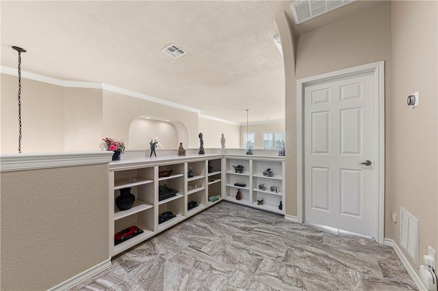 13953 Dasmarinas Dr, Corpus Christi, TX 78418 - interior space featuring ornamental molding, marble finish floors, baseboards, and decorative light fixtures