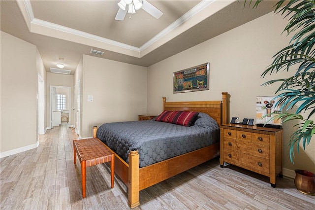 13953 Dasmarinas Dr, Corpus Christi, TX 78418 - bedroom with a raised ceiling, light wood-style floors, crown molding, baseboards, and a ceiling fan