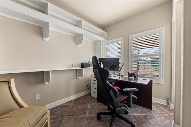 office with dark tile patterned floors