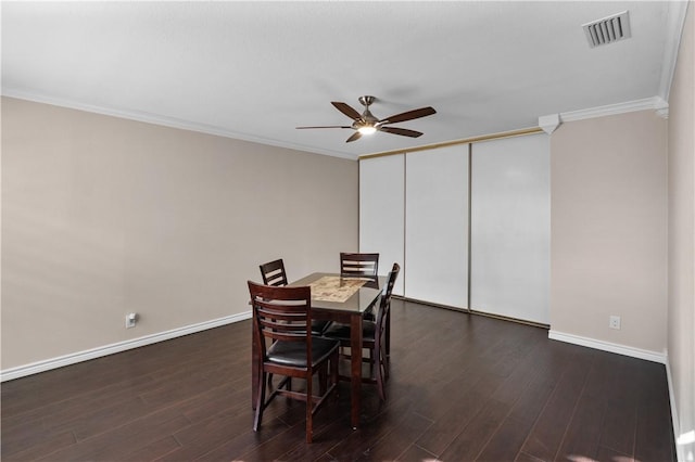 4902 Saratoga Blvd Unit 1, Corpus Christi, TX 78413 - dining room featuring ceiling fan, crown molding, dark wood-type flooring, and baseboards