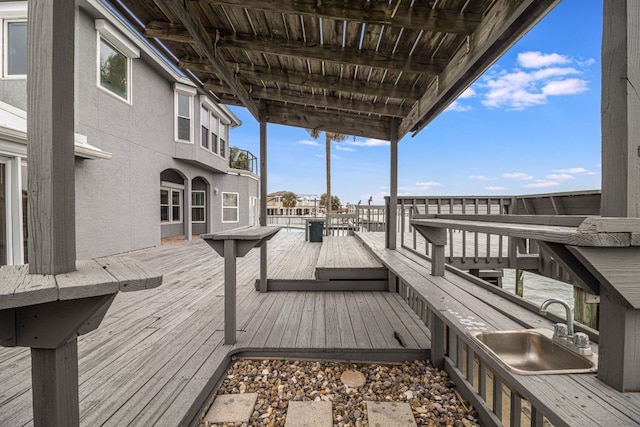 wooden terrace featuring sink