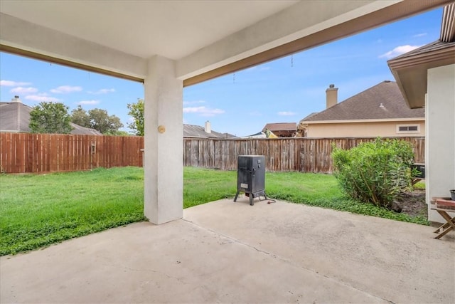 view of patio featuring a fenced backyard