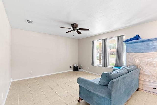 116 Greenway Ln, Rockport, TX 78382 - sitting room featuring ceiling fan and light tile patterned floors