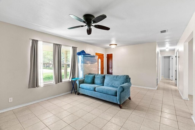 116 Greenway Ln, Rockport, TX 78382 - living room with a ceiling fan and light tile patterned floors