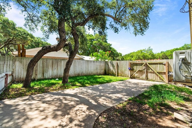 116 Greenway Ln, Rockport, TX 78382 - fenced backyard with a gate and a patio area