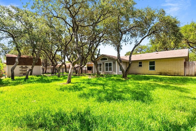 116 Greenway Ln, Rockport, TX 78382 - view of yard featuring a storage unit