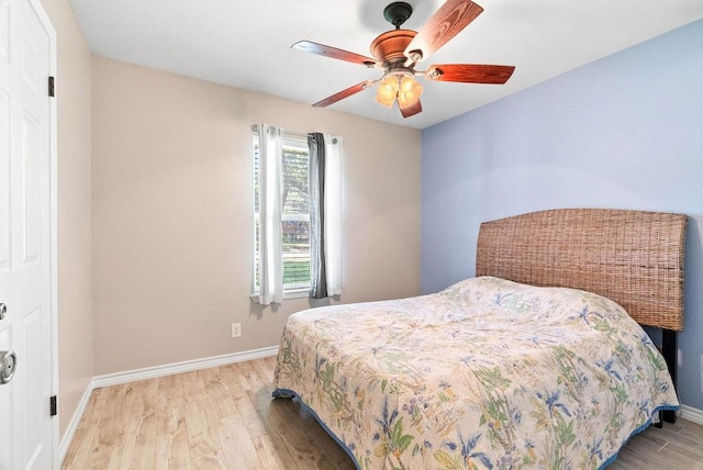 116 Greenway Ln, Rockport, TX 78382 - bedroom featuring light wood finished floors and a ceiling fan