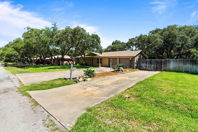 116 Greenway Ln, Rockport, TX 78382 - view of front of property with concrete driveway and an attached garage
