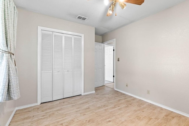 116 Greenway Ln, Rockport, TX 78382 - unfurnished bedroom featuring light wood-type flooring, a closet, and ceiling fan