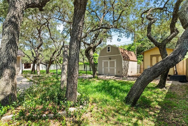 116 Greenway Ln, Rockport, TX 78382 - fenced backyard featuring a shed