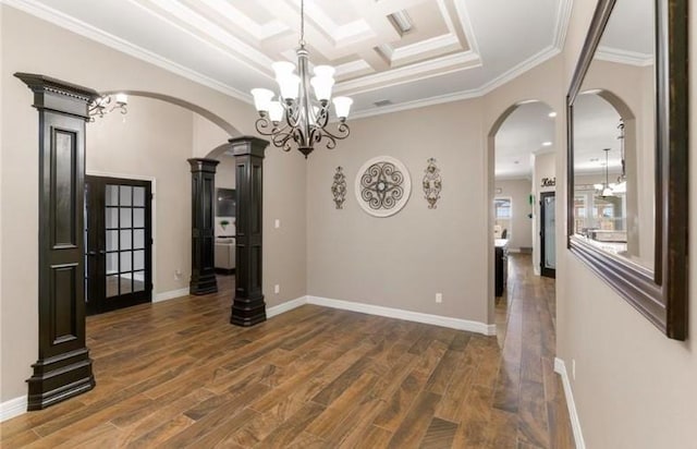2013 Magnolia Falls Dr, Corpus Christi, TX 78415 - unfurnished dining area featuring ornamental molding, wood finished floors, arched walkways, coffered ceiling, and a notable chandelier
