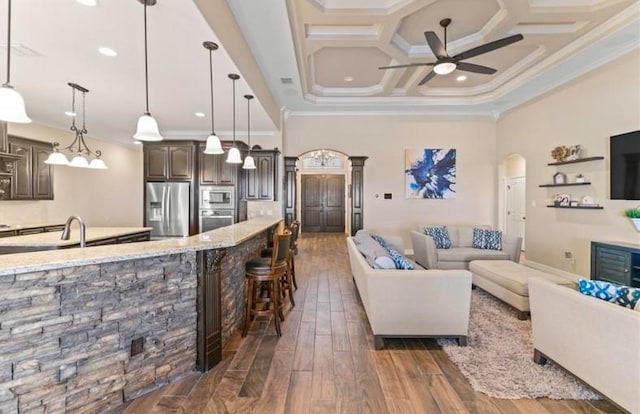 2013 Magnolia Falls Dr, Corpus Christi, TX 78415 - living room with a ceiling fan, ornamental molding, coffered ceiling, and dark wood-type flooring