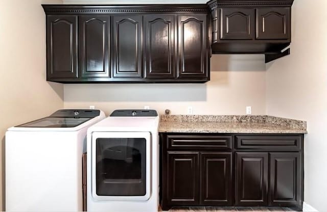 2013 Magnolia Falls Dr, Corpus Christi, TX 78415 - laundry area with washing machine and clothes dryer and cabinet space