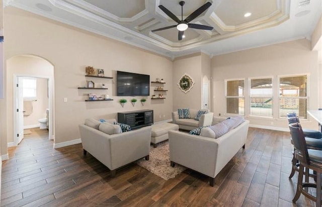 2013 Magnolia Falls Dr, Corpus Christi, TX 78415 - living room with ornamental molding, a towering ceiling, a ceiling fan, arched walkways, and dark wood-type flooring